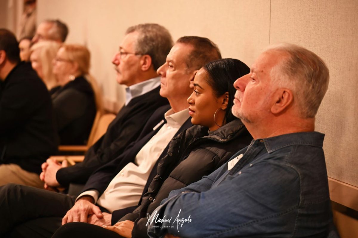 Attendees listening during the seminar
