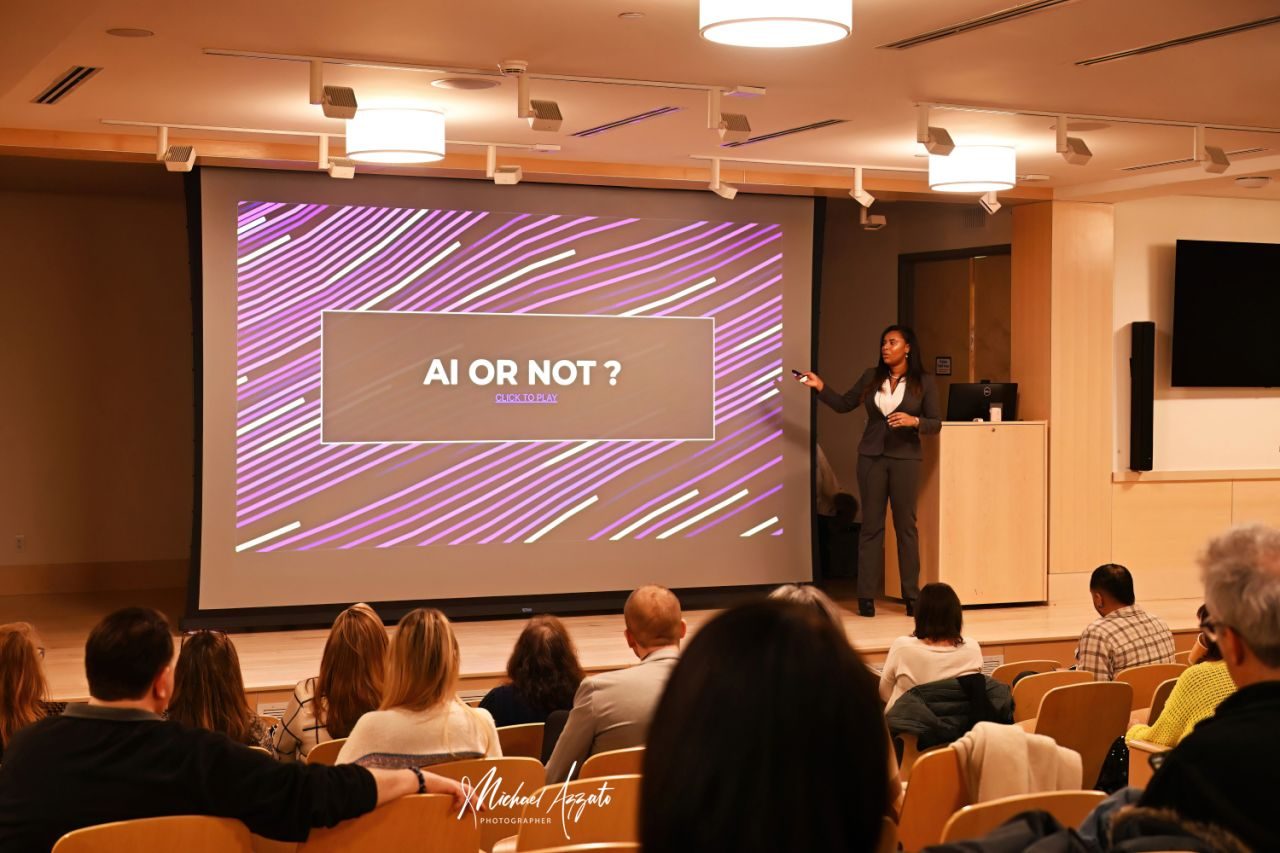 Alesha Taylor presenting at the front of the room